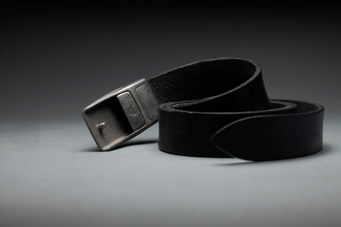Belts for work showing a black belt with metal buckle