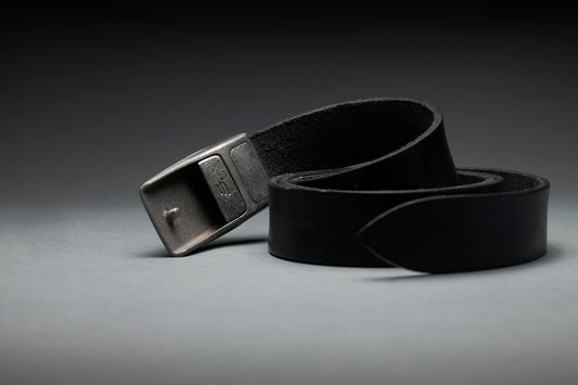 Belts for work showing a black belt with metal buckle