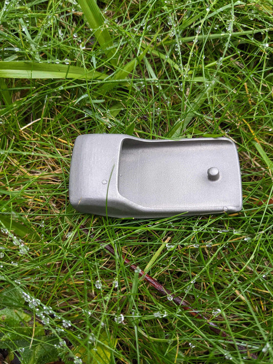 Buckle on wet grass