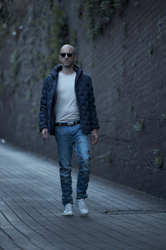 man walking wearing YOKU belt